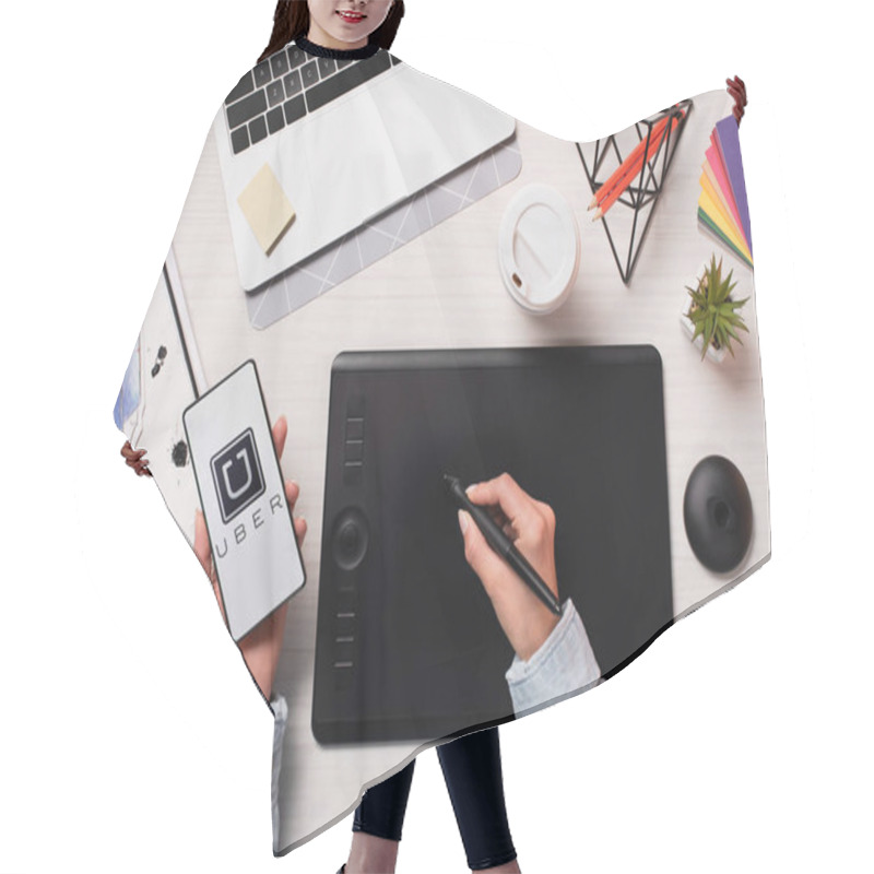 Personality  Cropped View Of Designer Using Graphics Tablet, Pen And Smartphone With Uber App On Screen, Flat Lay Hair Cutting Cape