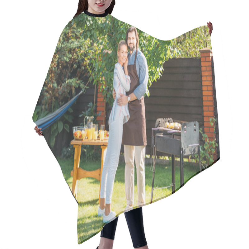 Personality  Smiling Couple Looking At Camera Having Barbecue On Backyard On Summer Day Hair Cutting Cape