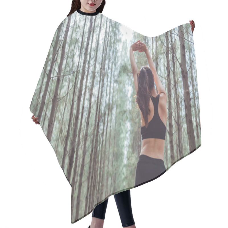 Personality  Women Stretching Arms And Breathing Fresh Air In Middle Of Pinewood Forest While Exercising. Workouts And Lifestyles Concept. Happy Life And Healthcare Theme. Nature And Outdoors Theme. Back View Hair Cutting Cape