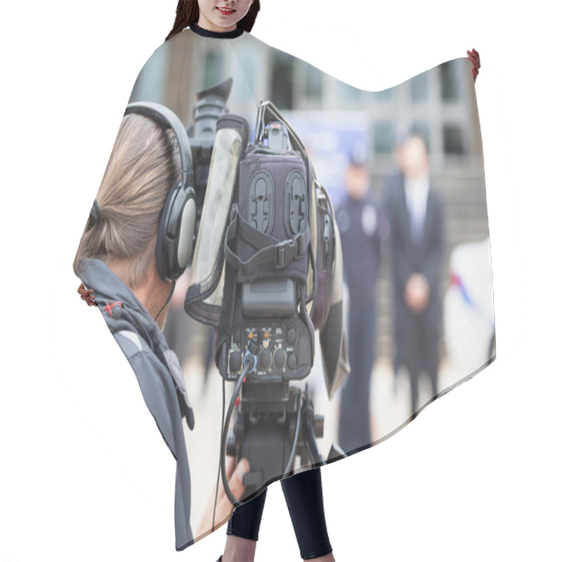 Personality  Cameraman. News Conference. Filming An Event With A Video Camera Hair Cutting Cape