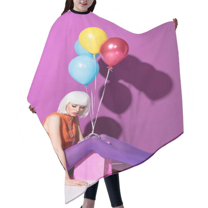 Personality  Sad Young Woman In White Wig With Air Balloons Sitting On Purple Background Hair Cutting Cape