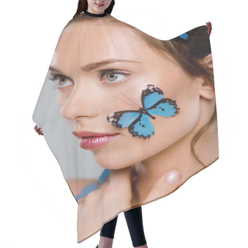 Personality  Selective Focus Of Young Woman With Blue Decorative Butterflies On Face Isolated On Grey  Hair Cutting Cape