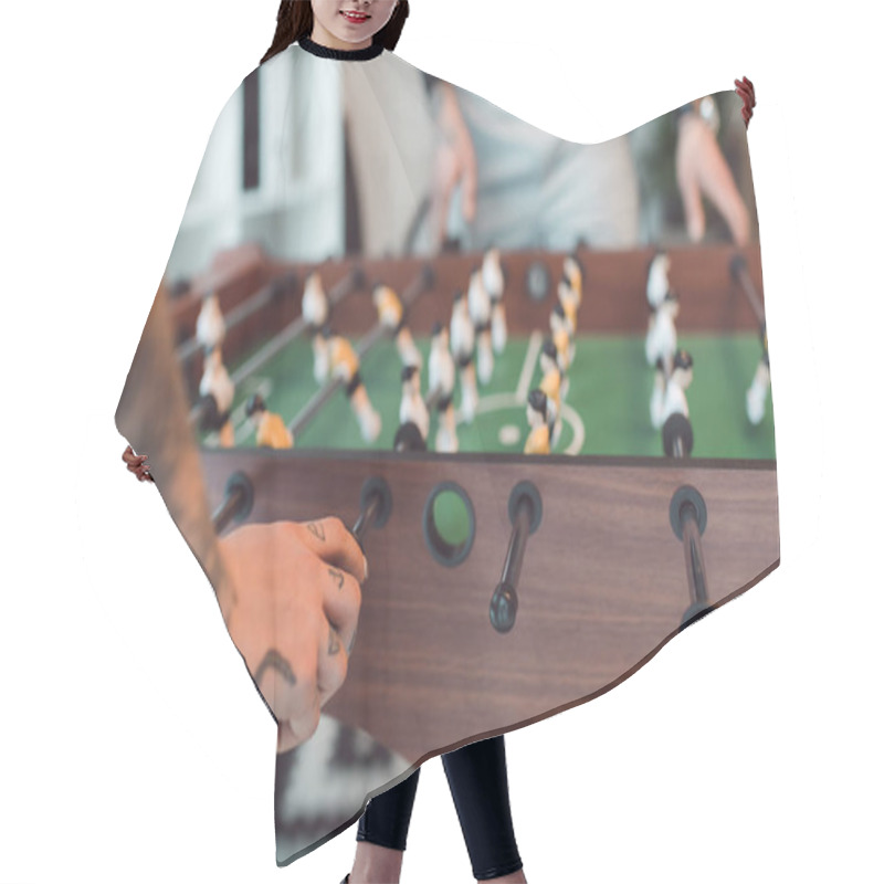 Personality  Selective Focus Of Colleagues Playing Table Football In Office Hair Cutting Cape