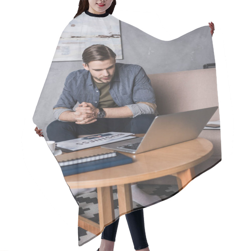 Personality  Young Businessman Looking At Laptop While Sitting On Couch Hair Cutting Cape