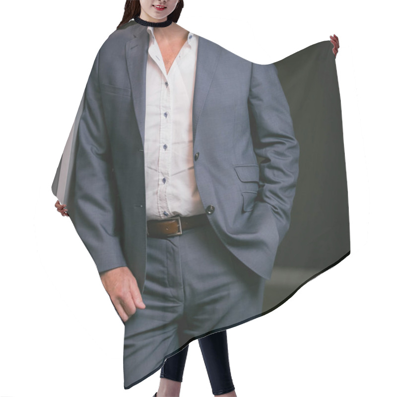 Personality  Cropped Head Man Standing In A Smart Suit With Hand One Hand In Pocket In An Office Hair Cutting Cape