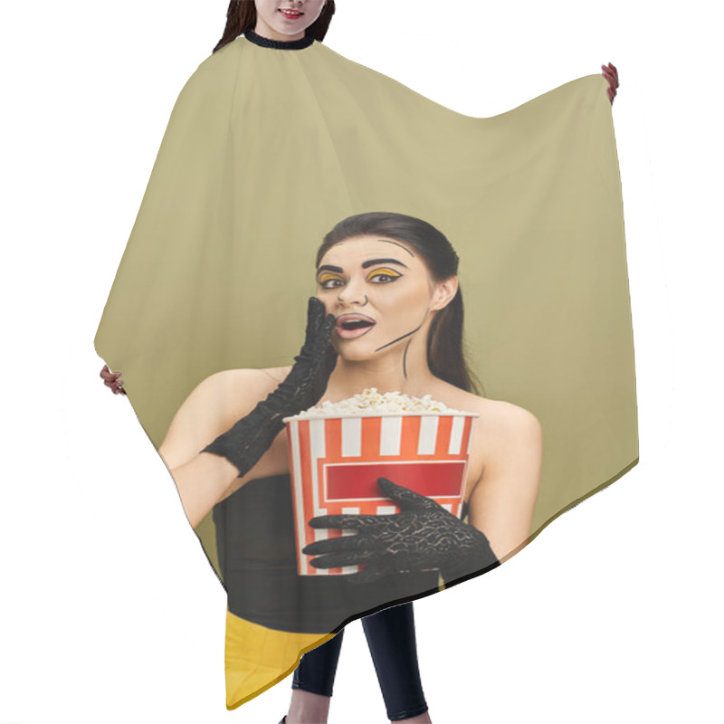 Personality  Brunette Woman In Pop Art Makeup And Black Gloves Holds A Box Of Popcorn. Hair Cutting Cape