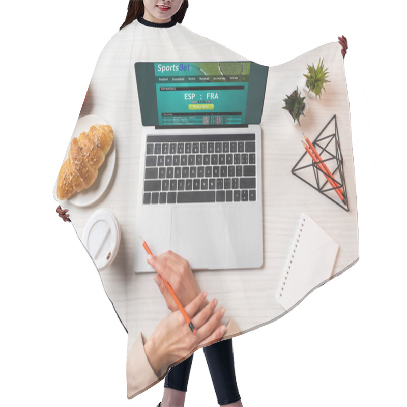 Personality  Cropped Shot Of Female Hands, Laptop With Sports Bet Website And Lunch On Table In Office     Hair Cutting Cape