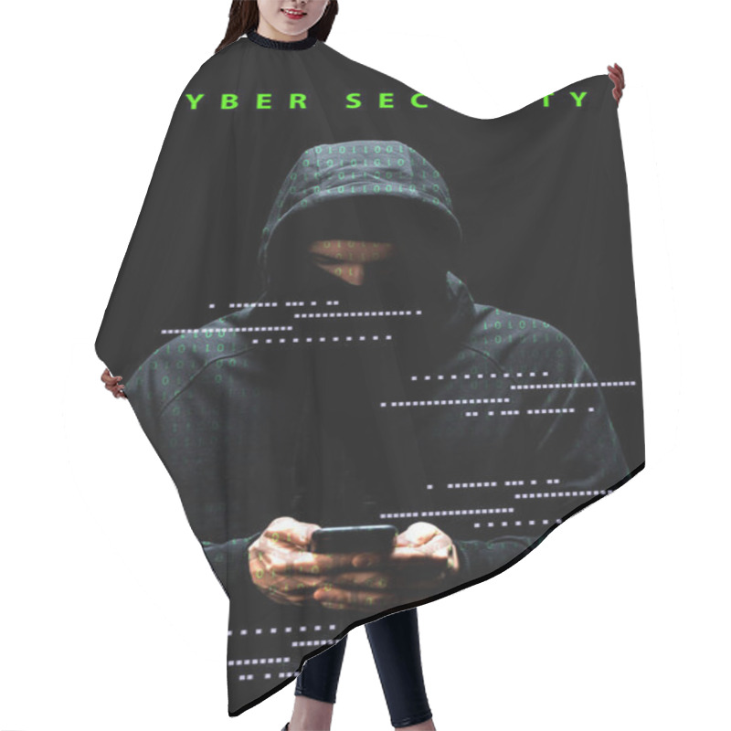 Personality  Hacker In Hood Using Smartphone Near Cyber Security Lettering On Black  Hair Cutting Cape