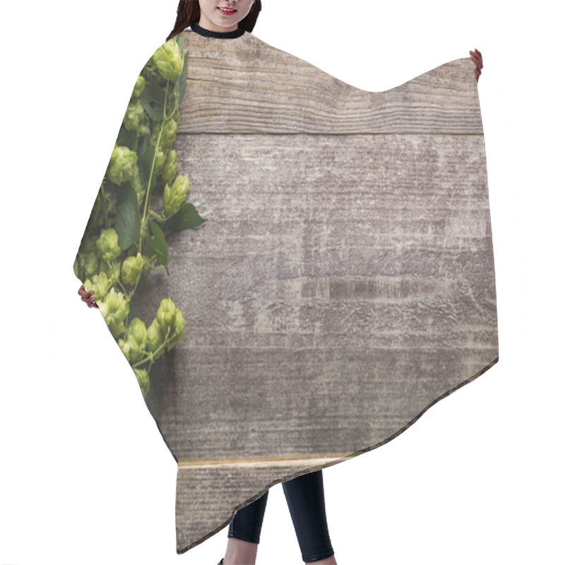 Personality  Top View Of Green Hop On Wooden Background With Copy Space Hair Cutting Cape