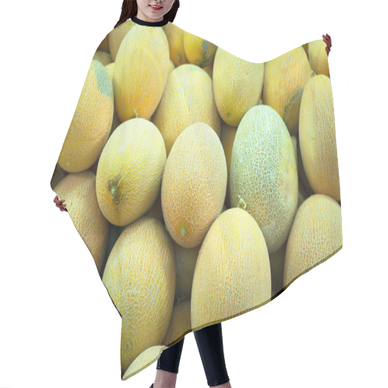 Personality  Fresh Melon Laid Out On The Counter Of The Market. Top View. Close-up Hair Cutting Cape