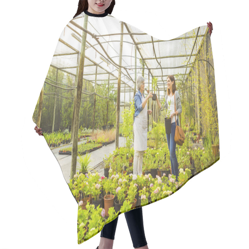 Personality  Worker And Customer In A Green House Hair Cutting Cape