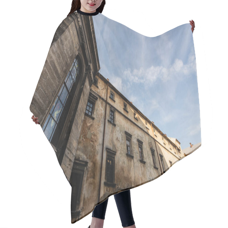 Personality  Low Angle View Of Old Stone Building Against Blue Sky In Lviv, Ukraine Hair Cutting Cape