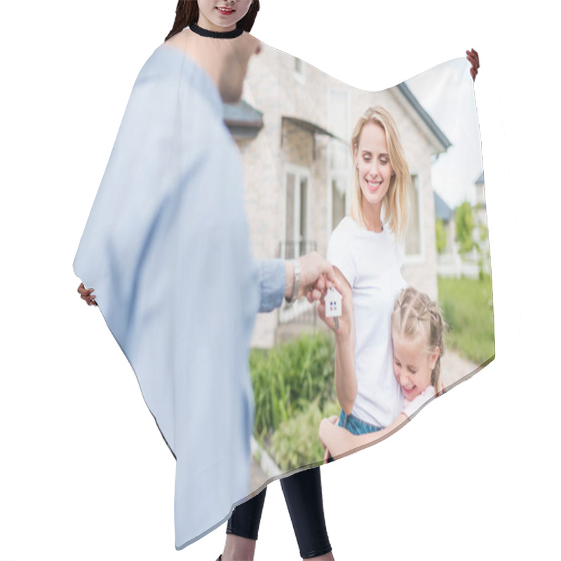 Personality  Partial View Of Real Estate Agent Giving Key To Young Woman With Daughter In Front Of New House Hair Cutting Cape