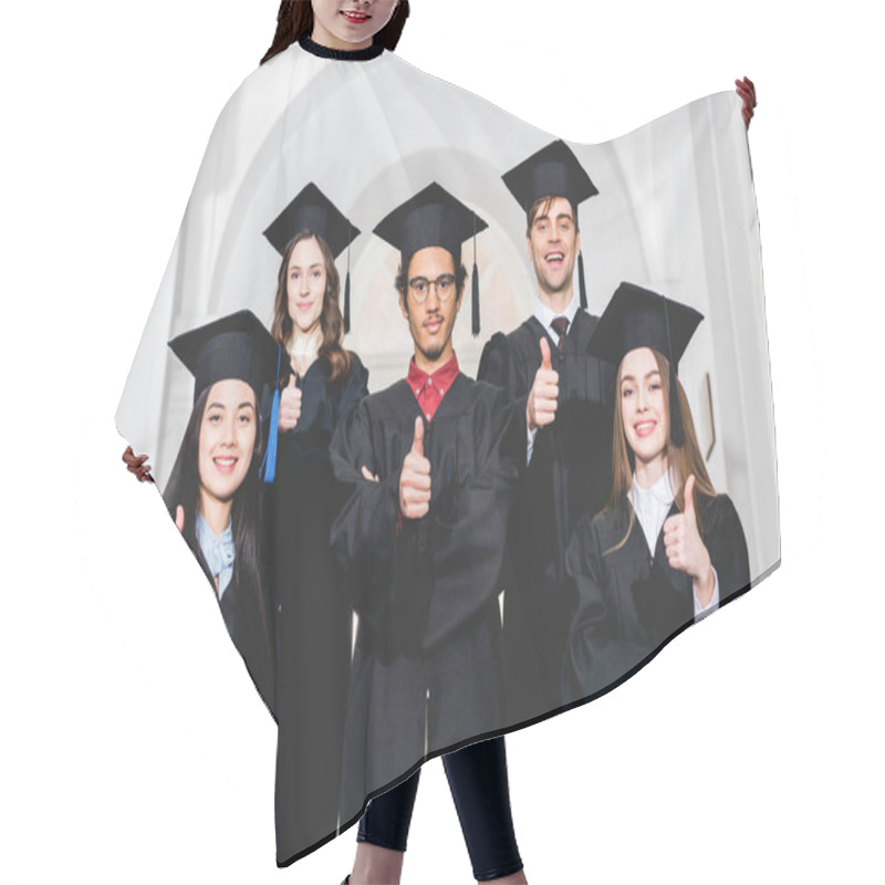 Personality  Cheerful Students In Graduation Gowns Standing And Showing Thumbs Up Hair Cutting Cape