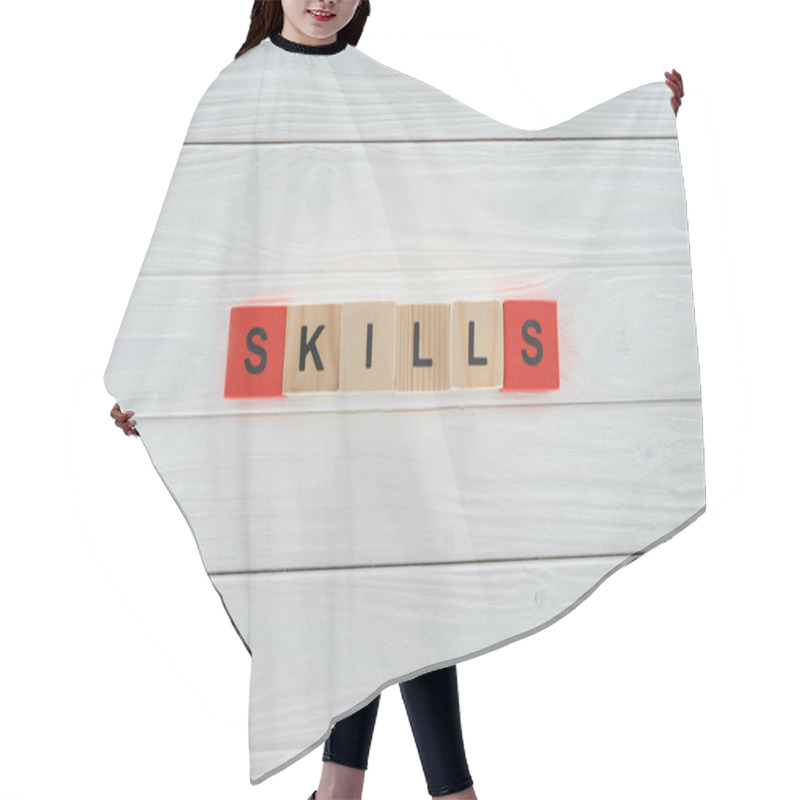 Personality  Top View Of Skills Inscription Made Of Blocks On White Wooden Surface Hair Cutting Cape