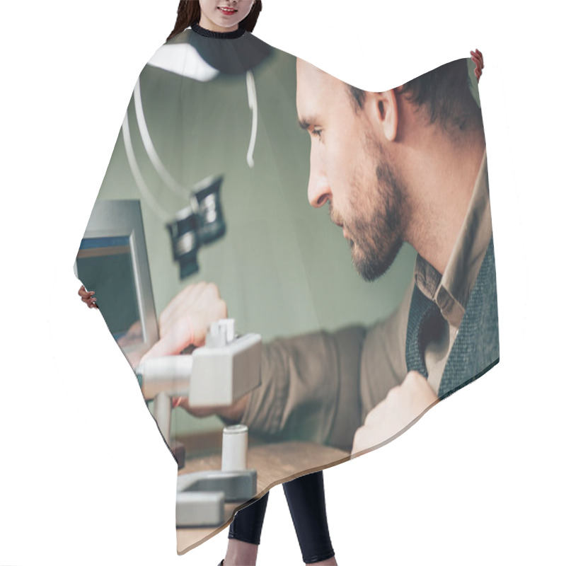 Personality  Side View Of Watchmaker Using Timegrapher While Working At Table Hair Cutting Cape