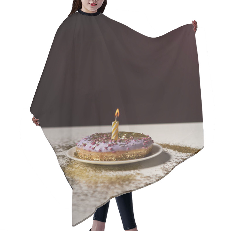 Personality  Candle In Middle Of Sweet Donut With Shiny Sparkles On White Table Isolated On Black Hair Cutting Cape