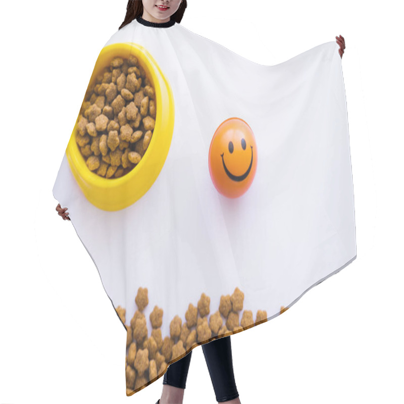 Personality  Top View Of Ball With Smiley Emoticon Near Pet Food In Bowl Isolated On White Hair Cutting Cape