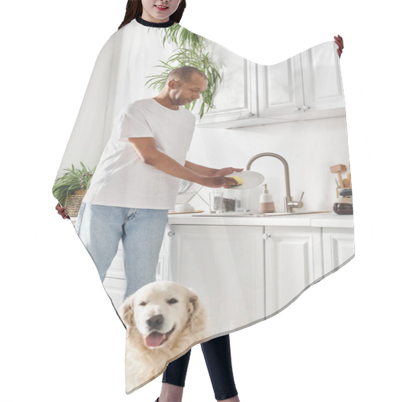 Personality  An African American Man Standing In A Kitchen Next To His Labrador Dog. Hair Cutting Cape