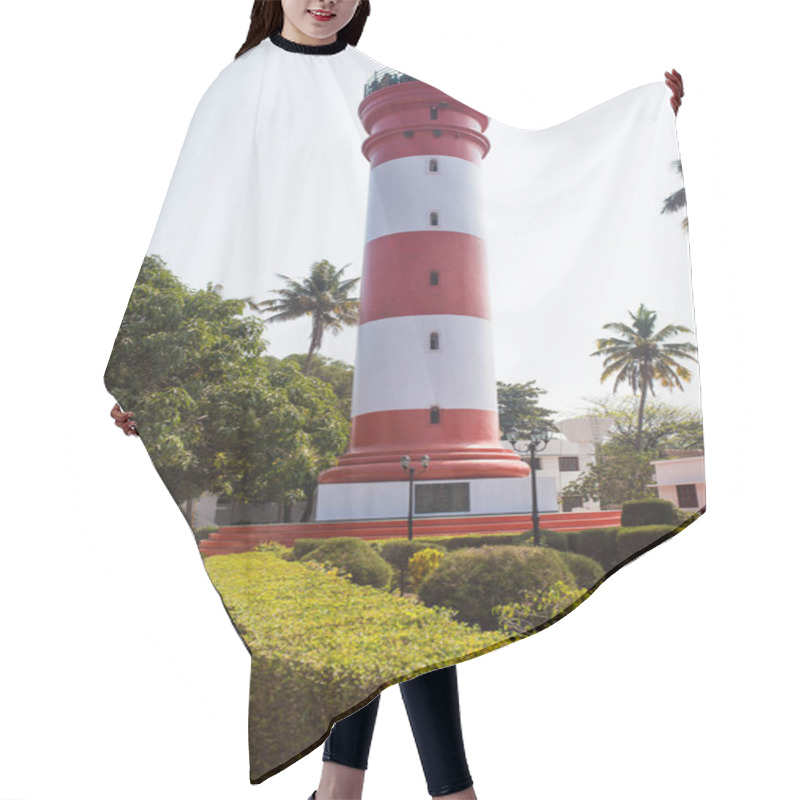 Personality  Alapuzha, Kerala, India-January 29, 2019. The Main Attraction Of Alapuzha Is The Lighthouse. High Red And White Lighthouse Among Tropical Greenery, Palm Trees, Visited By Tourists. Hair Cutting Cape