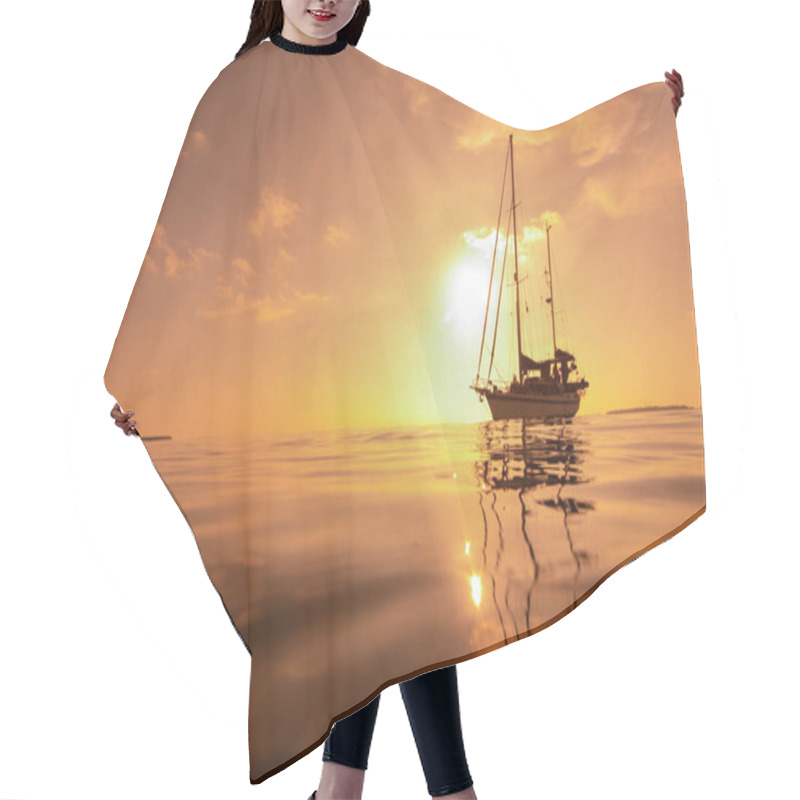 Personality  Luxury Sailing Yacht In Front Of Beautiful Golden Incredible Sunset In Tropical Ocean. Romantic Trip. Summer Holiday Vacation Travel Concept. Selective Focus. Hair Cutting Cape