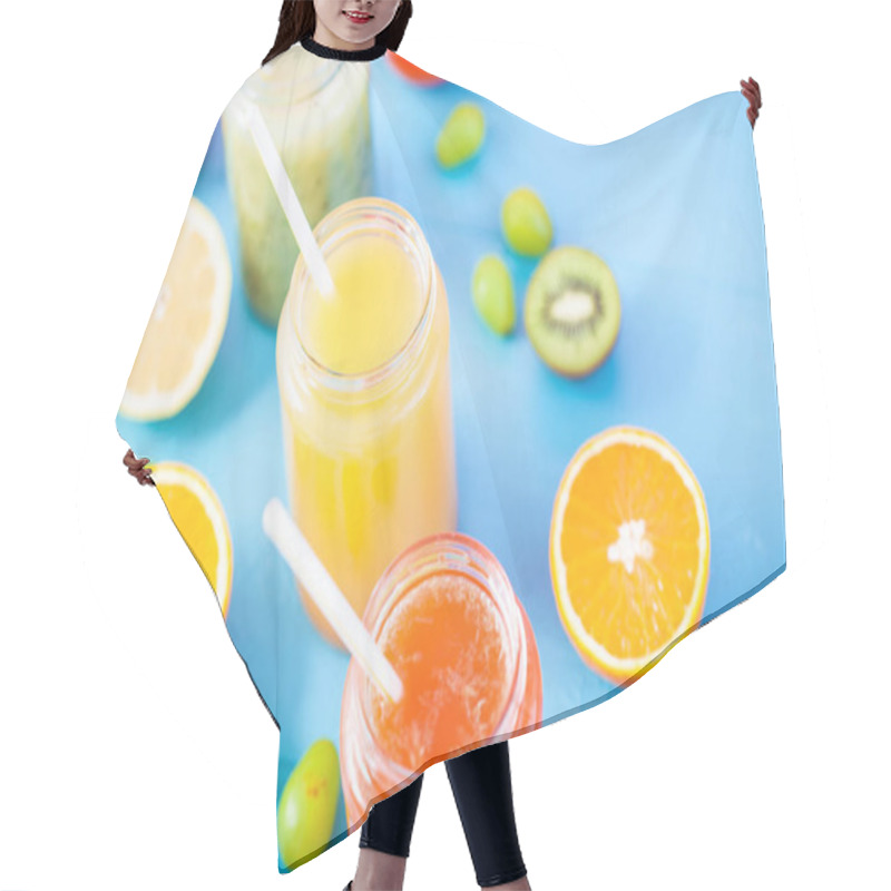 Personality  Freshly Squeezed Fruit Juice, Smoothies Yellow Orange Green Blue Banana Lemon Apple Orange Kiwi Grape Strawberry On Bright Blue Background Copy Space Hair Cutting Cape