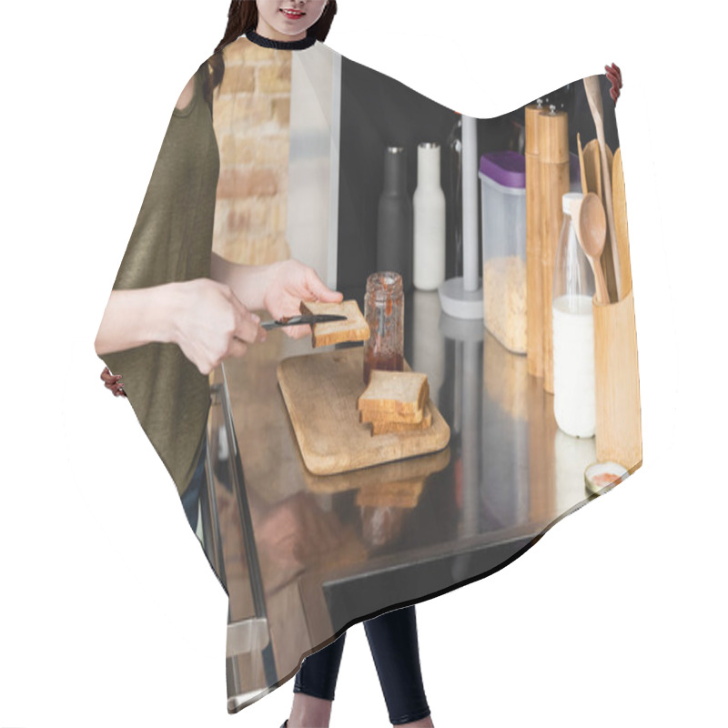 Personality  Cropped View Of Woman Pouring Jam On Toast On Kitchen Worktop  Hair Cutting Cape