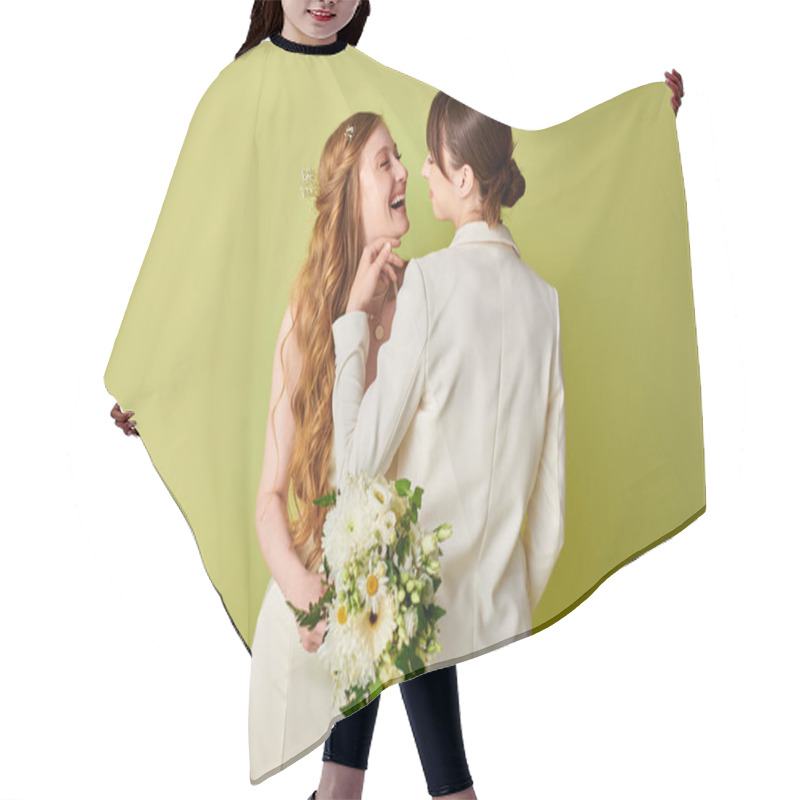 Personality  Two Young Women In White Wedding Attire Smile At Each Other Against A Green Backdrop. Hair Cutting Cape