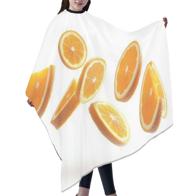 Personality  Fresh Orange Slices Floating Elegantly Against A Clean White Background. Hair Cutting Cape