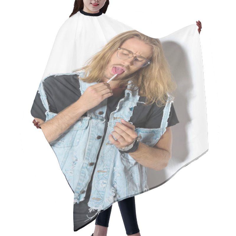 Personality  Young Man In Denim Vest Licking Rolled Joint On White Hair Cutting Cape