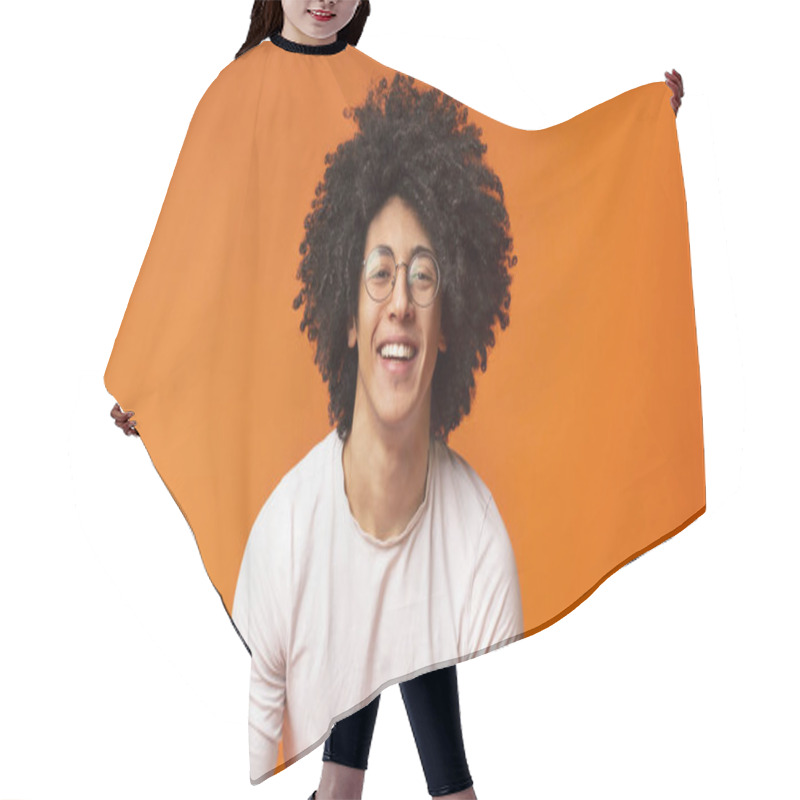 Personality  Happy Millennial Black Guy Laughing On Orange Background Hair Cutting Cape