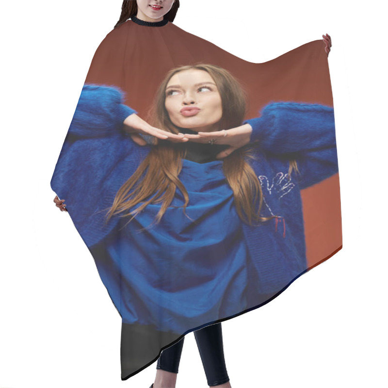 Personality  A Vibrant And Stylish Woman Poses With Playful Expressions In Her Trendy Blue Outfit. Hair Cutting Cape