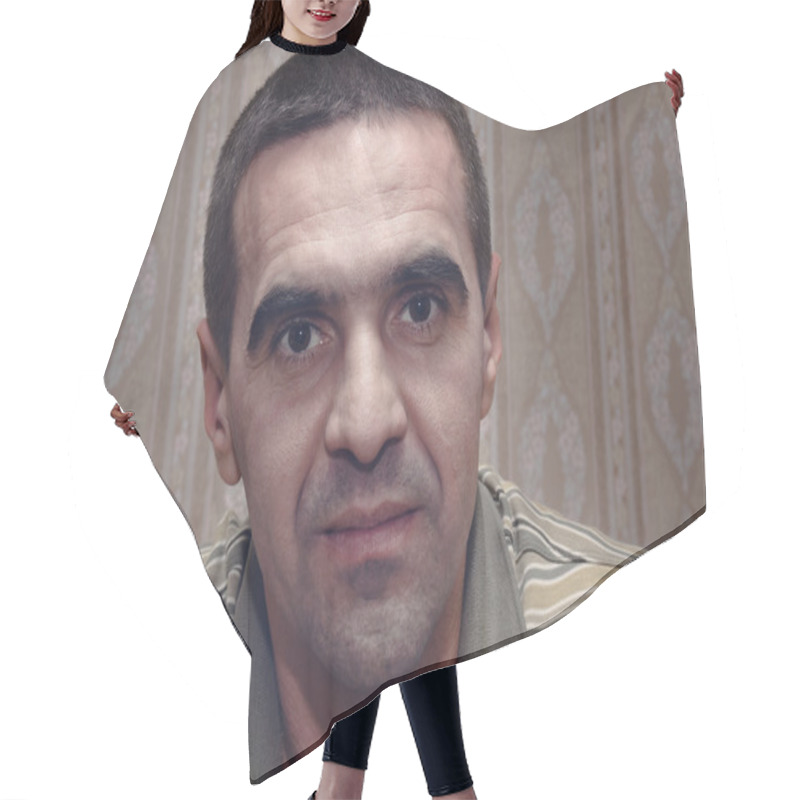 Personality  Middle-aged Man With A Serious Intent Expression Hair Cutting Cape