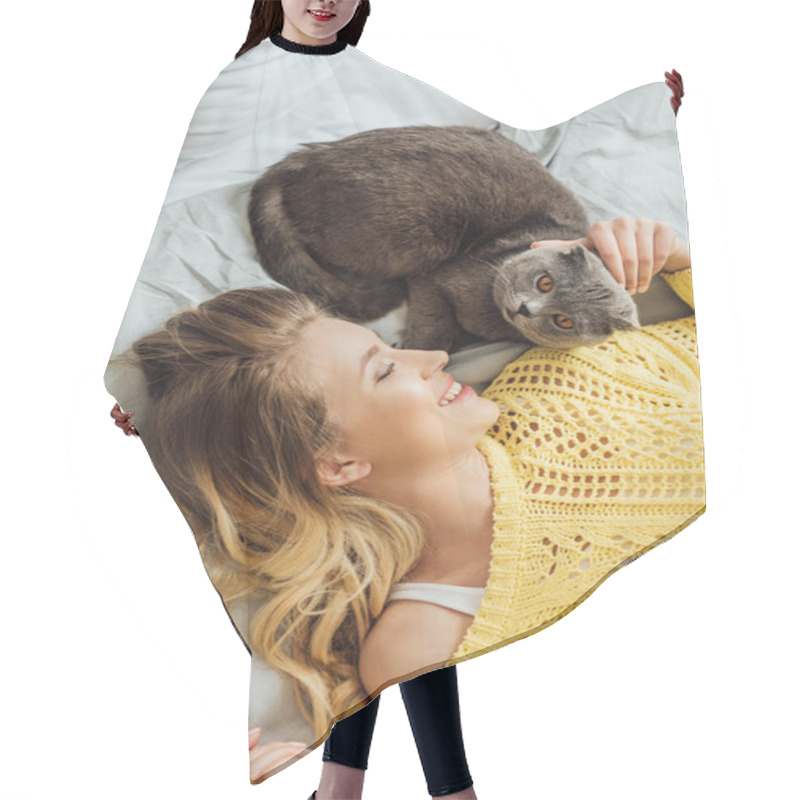 Personality  Top View Of Beautiful Smiling Girl In Knitted Sweater Stroking Scottish Fold Cat While Lying In Bed At Home Hair Cutting Cape