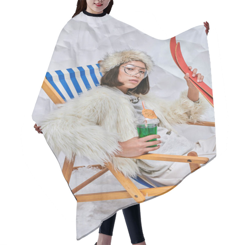 Personality  Glamour Asian Woman In Faux Fur  Jacket In Deck Chair With Cocktail And Skis On White Backdrop Hair Cutting Cape