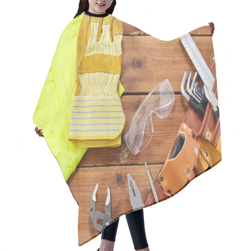 Personality  Different Work Tools In Belt On Wooden Boards Hair Cutting Cape