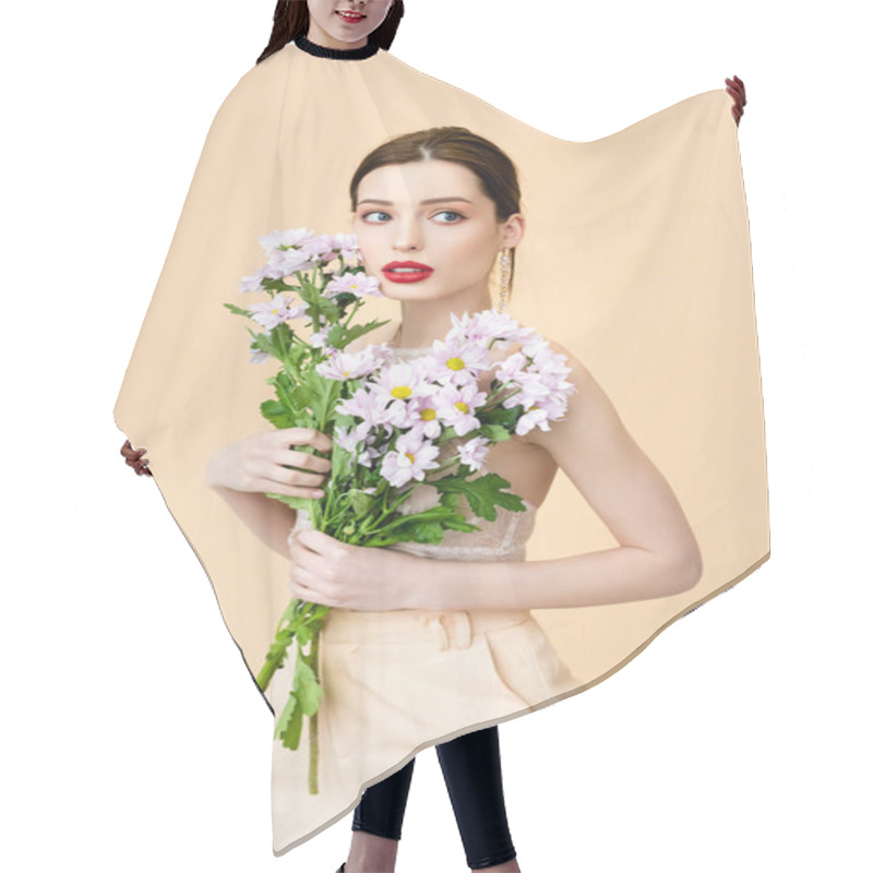 Personality  Pretty Woman Looking Away And Holding Blooming Chrysanthemum Flowers On Beige  Hair Cutting Cape