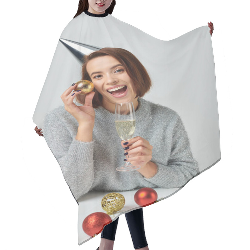 Personality  Excited Woman In Party Cap Holding Champagne Glass And Christmas Bauble On Grey, Happy New Year Hair Cutting Cape