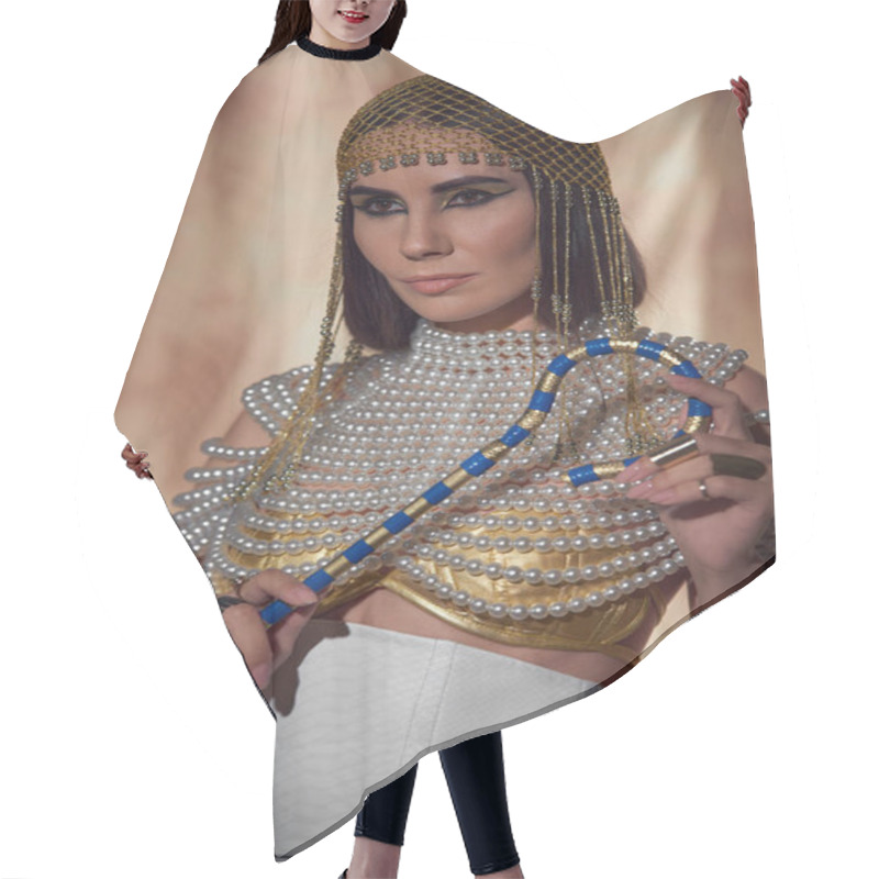 Personality  Elegant Woman In Headdress And Pearl Top Holding Egyptian Crook On Abstract Background Hair Cutting Cape