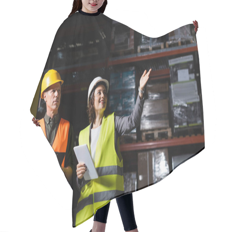 Personality  Happy Warehouse Employee With Tablet Pointing Away Near Supervisor In Hard Hat And Safety Vest Hair Cutting Cape