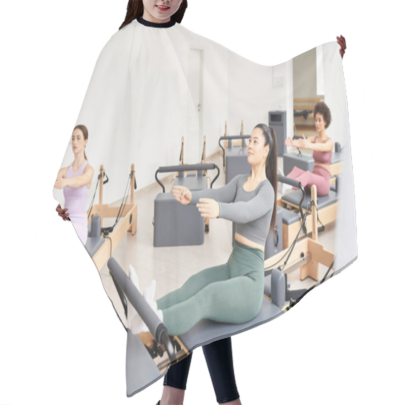 Personality  Diverse Group Of Women Performing Pilates Exercises In A Class. Hair Cutting Cape