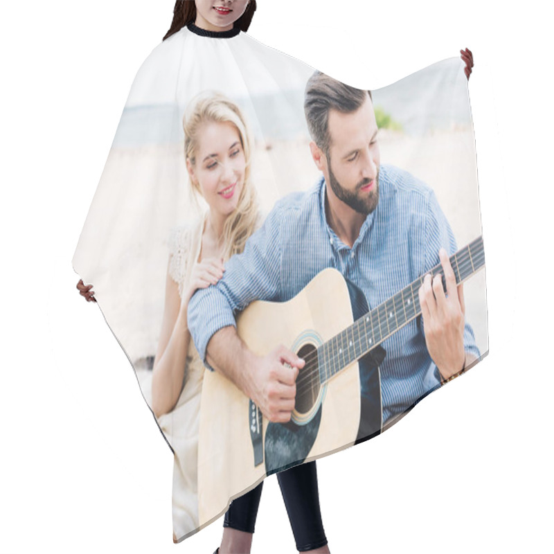 Personality  Young Blonde Barefoot Woman Sitting On Blanket Near Boyfriend With Acoustic Guitar At Beach Near Sea Hair Cutting Cape