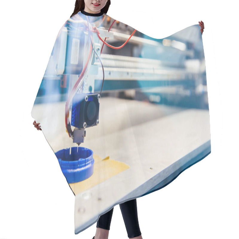 Personality  Freshly Printed Blue Plastic Detail On The Platform Of 3d Printer Hair Cutting Cape