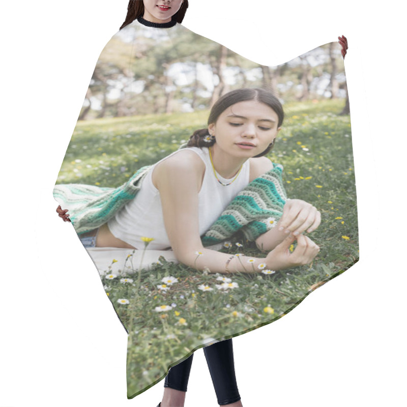 Personality  Young Woman Holding Daisy Flower While Lying On Meadow In Summer Park  Hair Cutting Cape