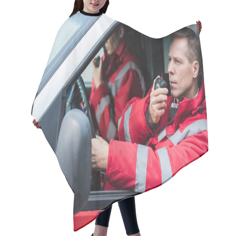 Personality  Male And Female Paramedics Talking By Portable Radios Hair Cutting Cape