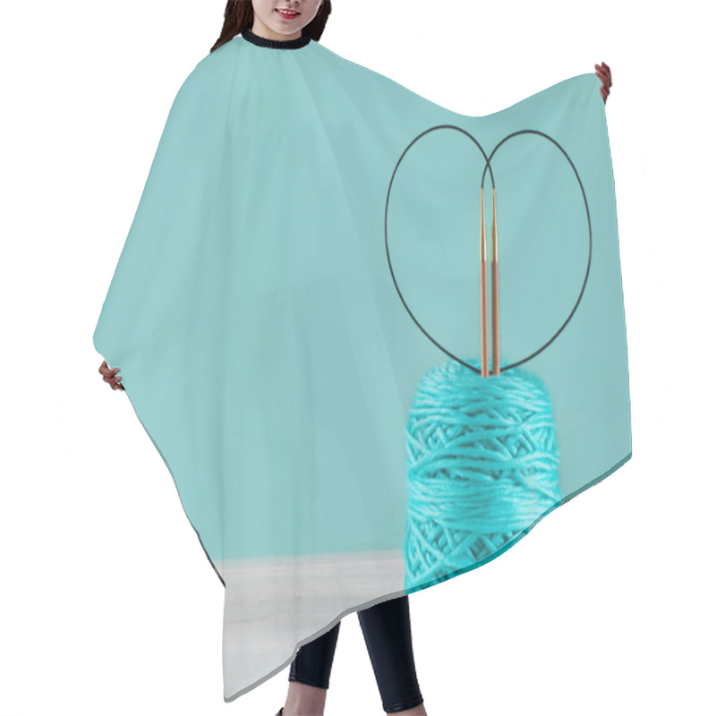 Personality  Skein Of Mint Yarn And Circular Wooden Knitting Needles In The S Hair Cutting Cape