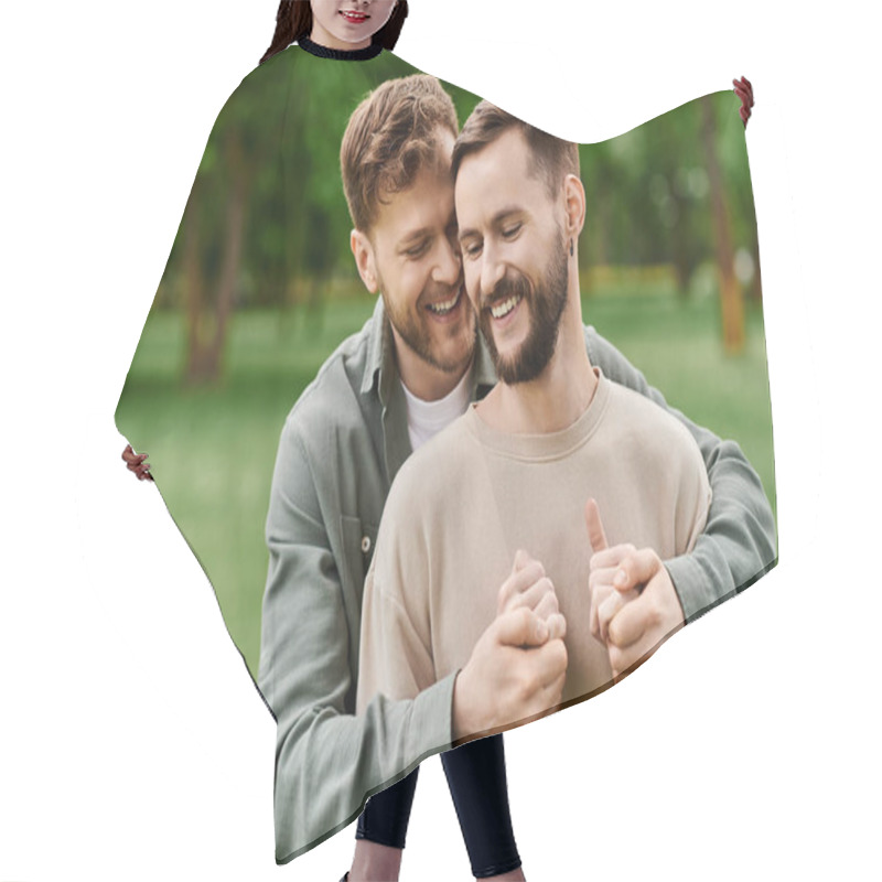 Personality  Two Bearded Men, A Gay Couple, Hold Hands And Laugh In A Lush Green Park. Hair Cutting Cape