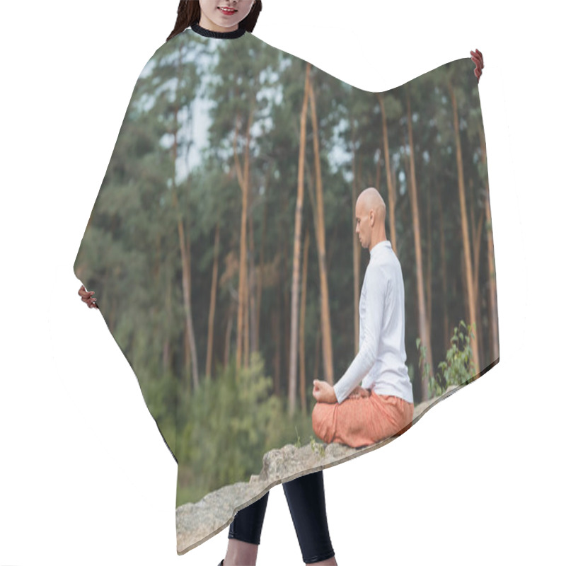 Personality  Side View Of Buddhist In White Sweatshirt Meditating In Lotus Pose In Forest Hair Cutting Cape