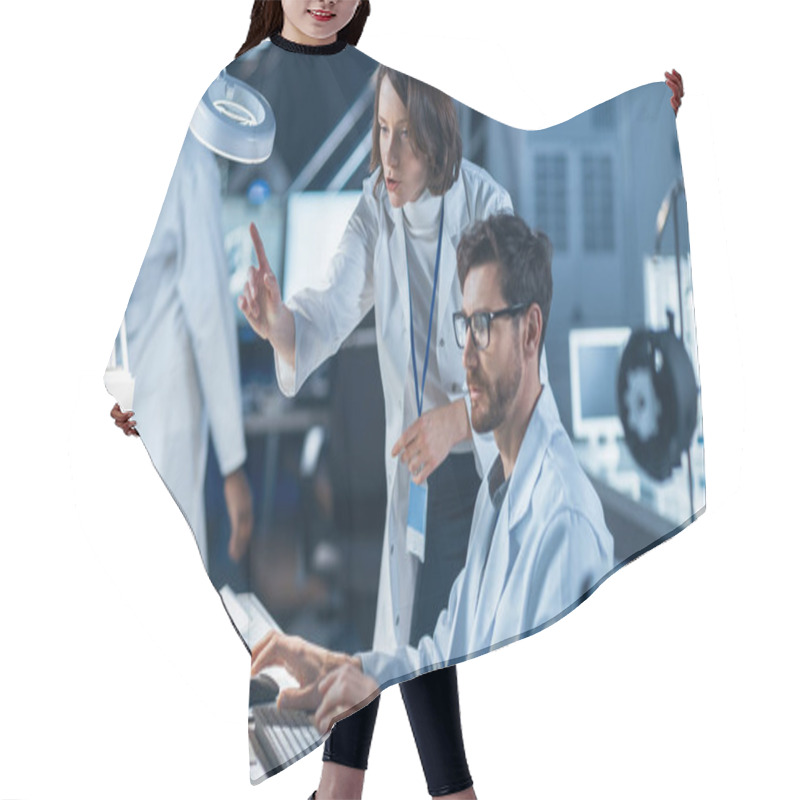 Personality  Machine Engine Development Engineer Working On Computer At His Desk, Talks With Female Project Manager. Team Of Professionals Working In The Modern Industrial Design Laboratory Hair Cutting Cape