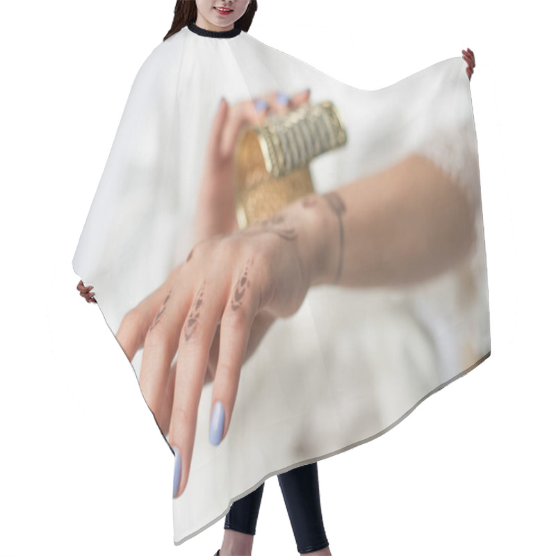 Personality  Cropped View Of Young Indian Woman With Mehndi On Hand Wearing Bracelet On White Hair Cutting Cape